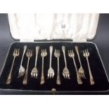 A cased set of eleven pickle forks (one missing), Sheffield 1939, weight 6oz approx.