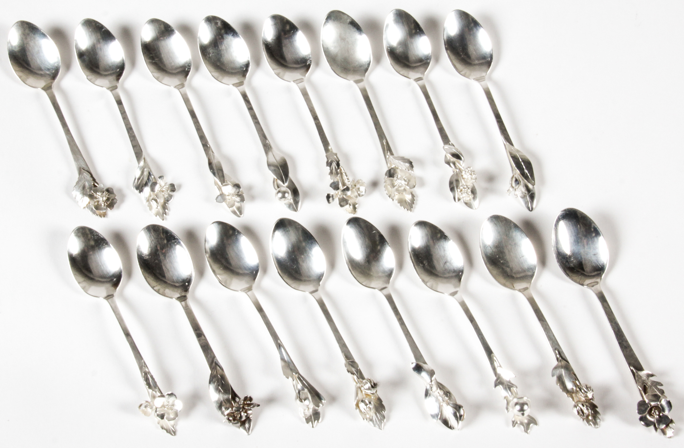 Sterling Silver Botanical Theme Ice Cream Spoons. Marked Sterling N Frost. Each spoon engraved