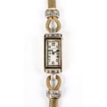 1930's Cartier Ladies Watch. Solid 10K gold braided bracelet in a cinched rope design with white