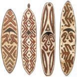 4 PNG Gope Boards. Ancestry or spirit boards. Oceania. Carved wood, pigment.  Size: Longest 38" x