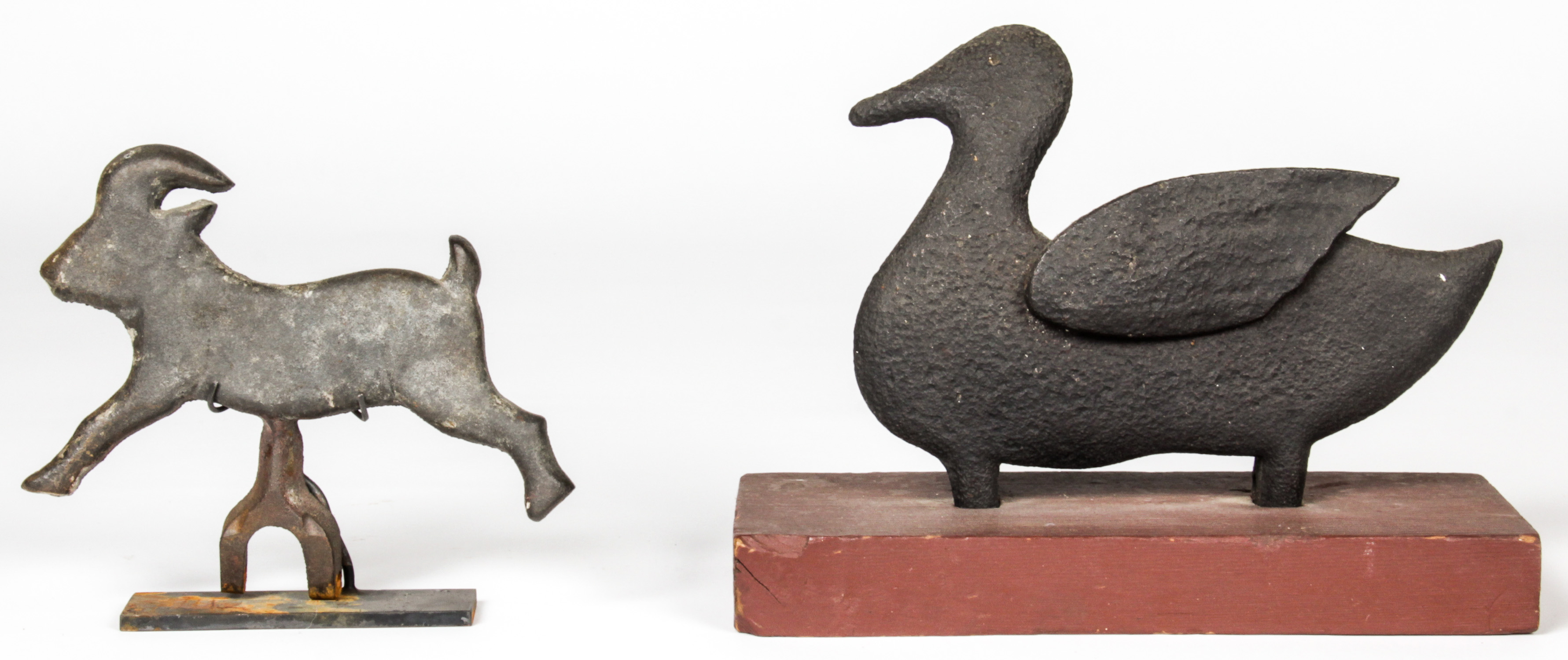 2 Vintage Cast Iron Carnival Knockdown Targets. One a duck form the other a goat. Size: 9" x 12" x