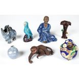 Asian Figural Pottery. 7 pcs comprised with a Chinese Qing dynasty blue glazed ceramic parrot and an