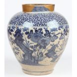 A Chinese Ming Style Blue and White Earthenware Jar. Coarse repair to rim. Size: 12.25" H (31 cm).