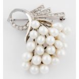 14K Gold, Pearl and Diamond Spray Brooch comprising matched Pearls and Diamonds set in White Gold.