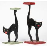 2 Black Cat Standees. Scrollsawn and painted wood. Size: 28" x 15" x 7", 71 x 38 x 18 cm.