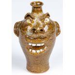 Terry King Face Jug. Signed King's Pottery NC. Size: 9.75" x 6.5" x 6" (25 x 17 x 15 cm).  Prov: