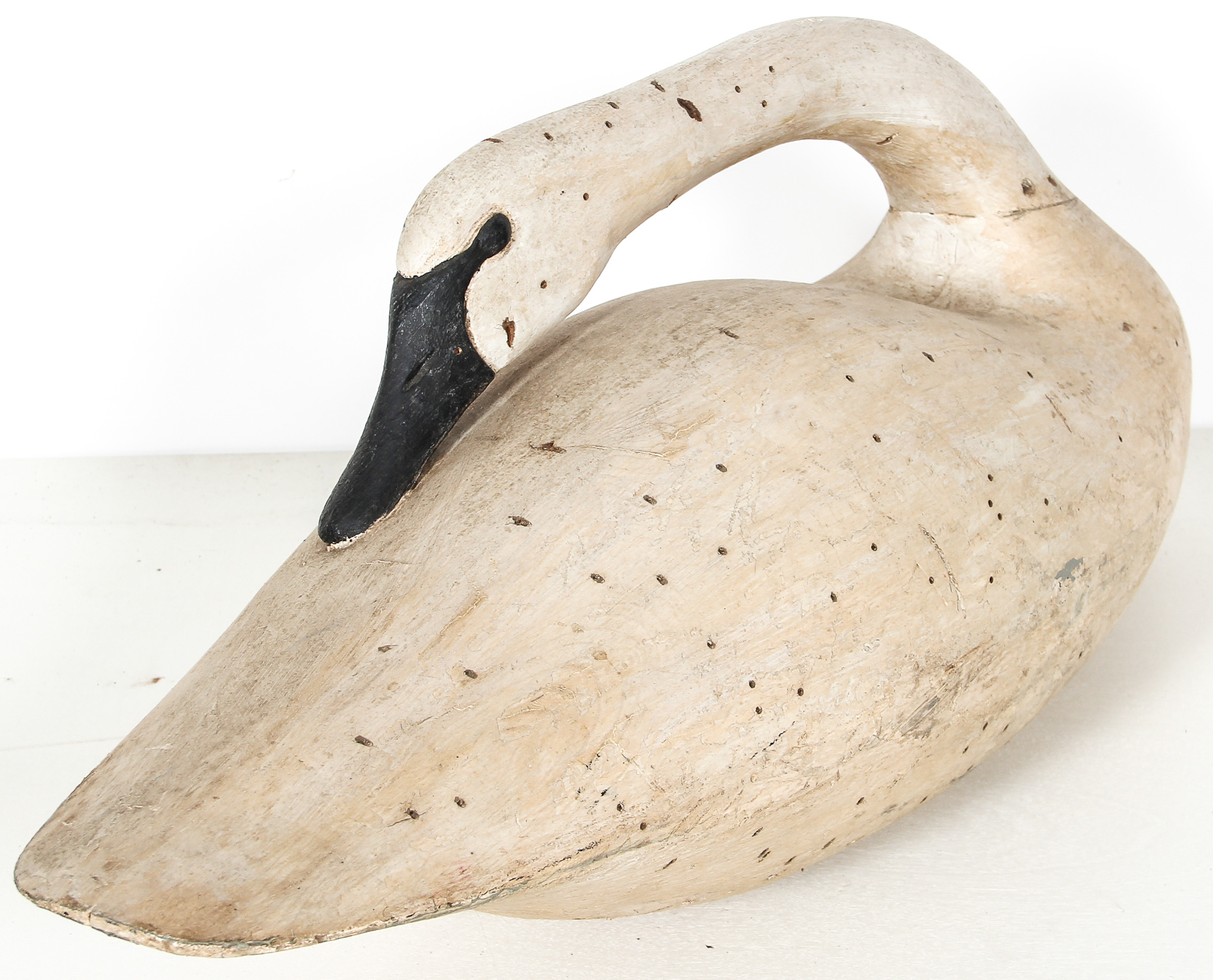 Early 20th C Preening Tundra Swan Confidence Decoy. Carved and painted timber. Size: 15" x 33" x - Image 2 of 5