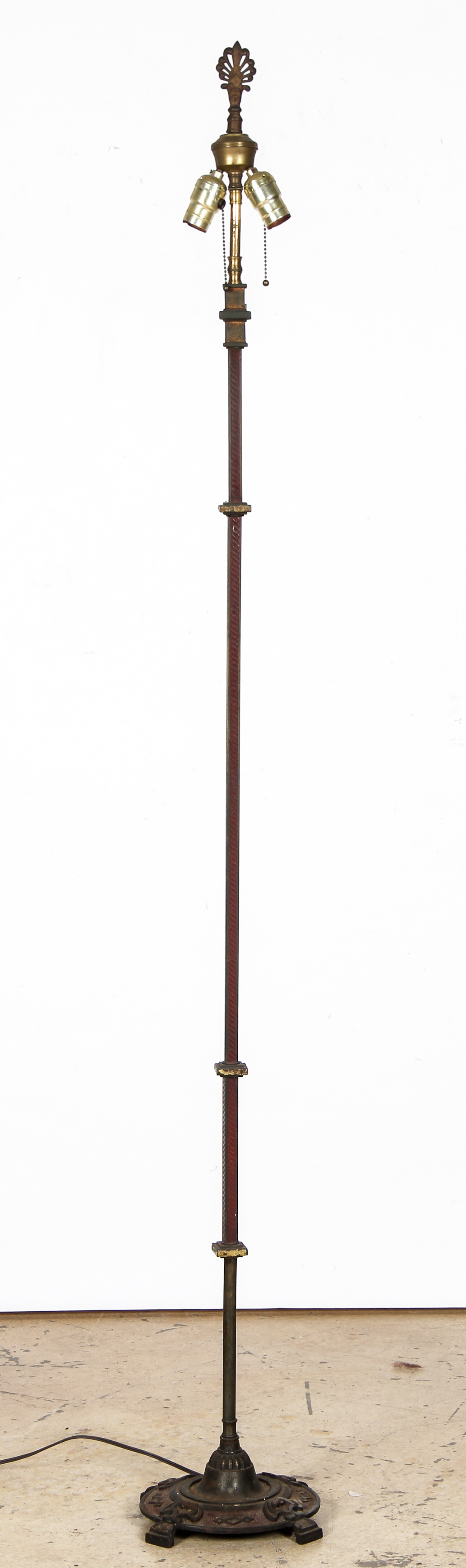 Arts And Crafts Style Cast Iron Torchiere. Stamped Rembrandt. Size: 69" x 14" x 14", 175 x 36 x 36