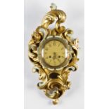 Westerstrand Giltwood Cartel Clock. Rococo style giltwood body. Swedish. Size: 24" x 12" x 4.5" (