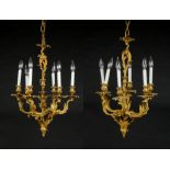 Pair Rococo Style Gilt Bronze Chandeliers. En suite with matching sconces. Each Size: 27" x 20" x