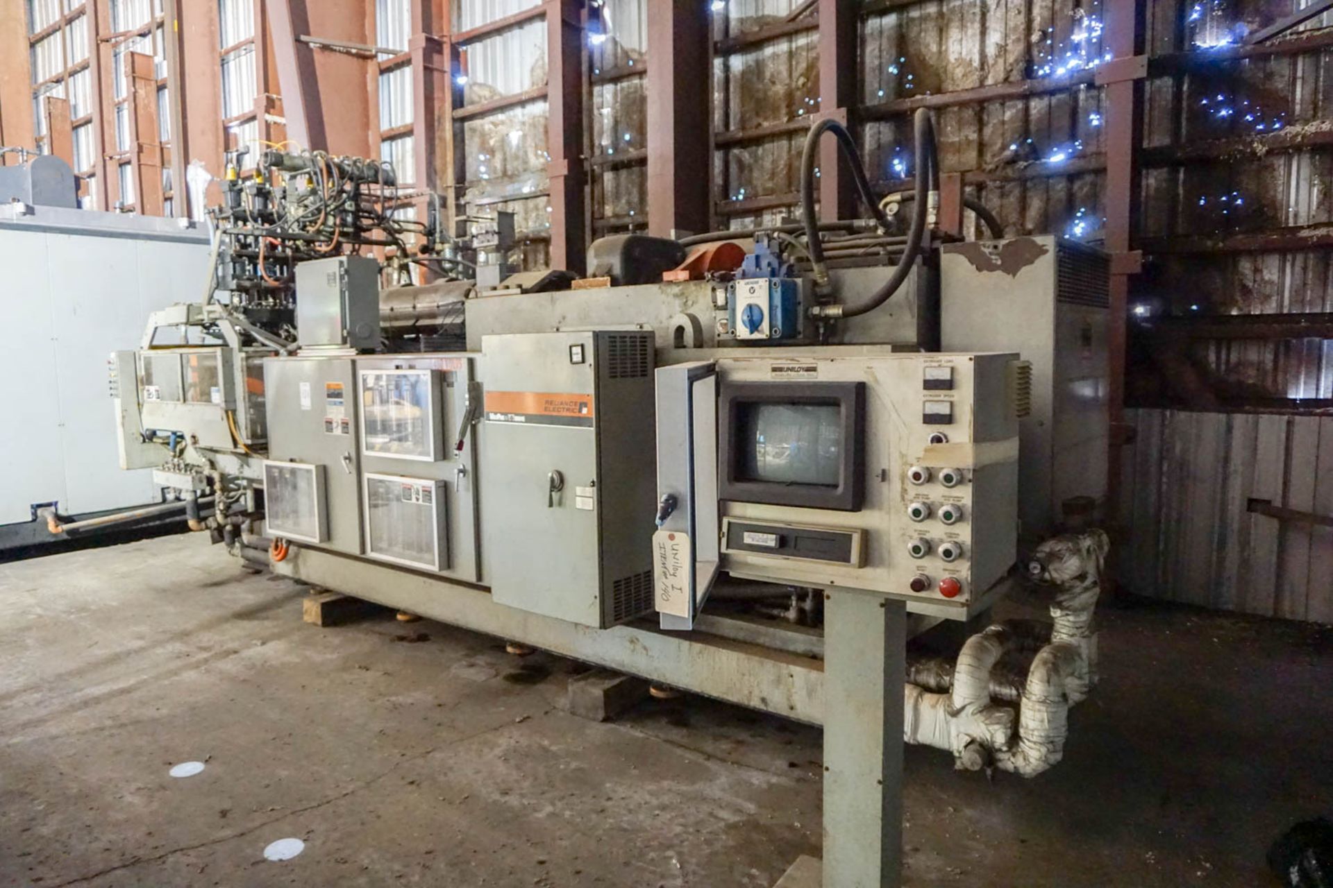 Uniloy 350 R-4 Blow Molder: 5 Head Machine, Capable of running many types of containers