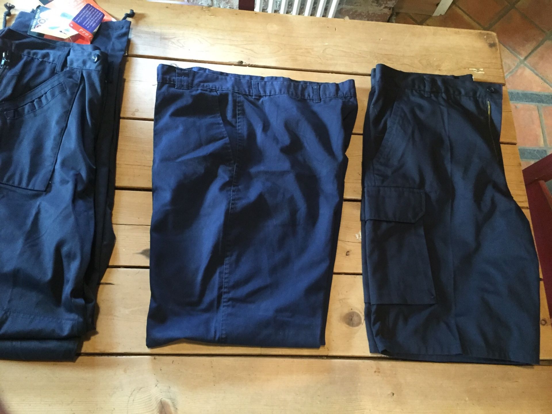 Job Lot 62 Pairs of Brand New mens UNEEK work trousers various sizes in blue - Image 8 of 10