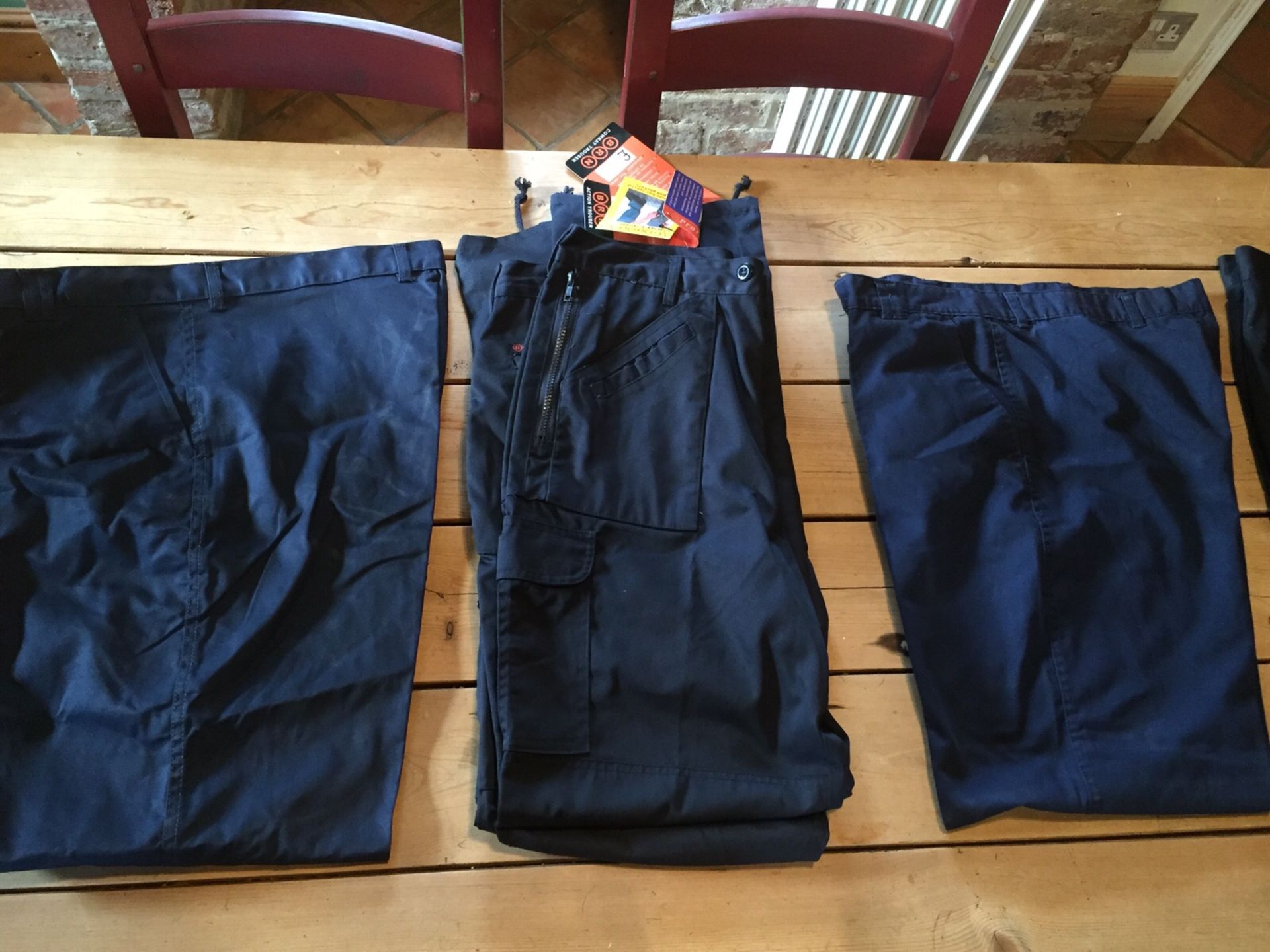 Job Lot 62 Pairs of Brand New mens UNEEK work trousers various sizes in blue