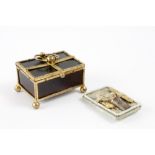 Rectangular box in tortoise shell in a golden bronze framework. Contains sewing items for children