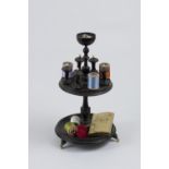 Cherrywood sewing stand made for 8 thread reels. At its top, a bowl to carry thimbles. Five
