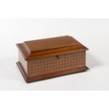 Rectangular sewing box in wooden marquetry with geometric patterns and a music box. The sewing