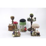 Lot of 5 sewing stands in wood or copper with needle and pin cushion, thread reels and thimbles.