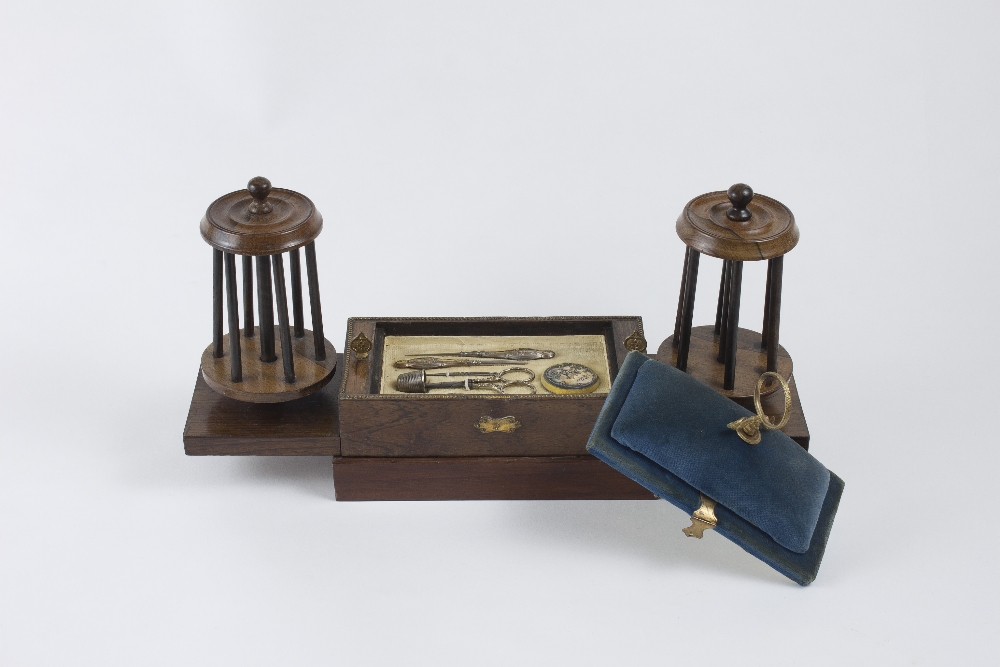 Important varnished wood casket surmounted by a needle and pin cushion and fixed on a wooden