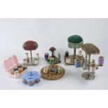 Lot of 7 sewing stands in diverse materials (wood, plastic, steel, copper) with thread reels and