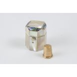Octagonal thimble holder case in mother-of-pearl and golden metal. H: 3.8cm and W: 3cm.