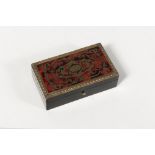 Rectangular box in black lacquered wood. Red inlaid lid with copper in the style of Boulle. It is