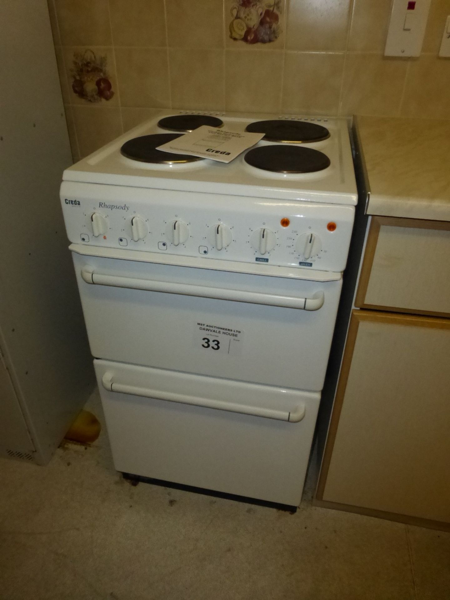 1 Creda Rhapsody white enamelled domestic cooker with oven and 4 top rings (located in room 11)