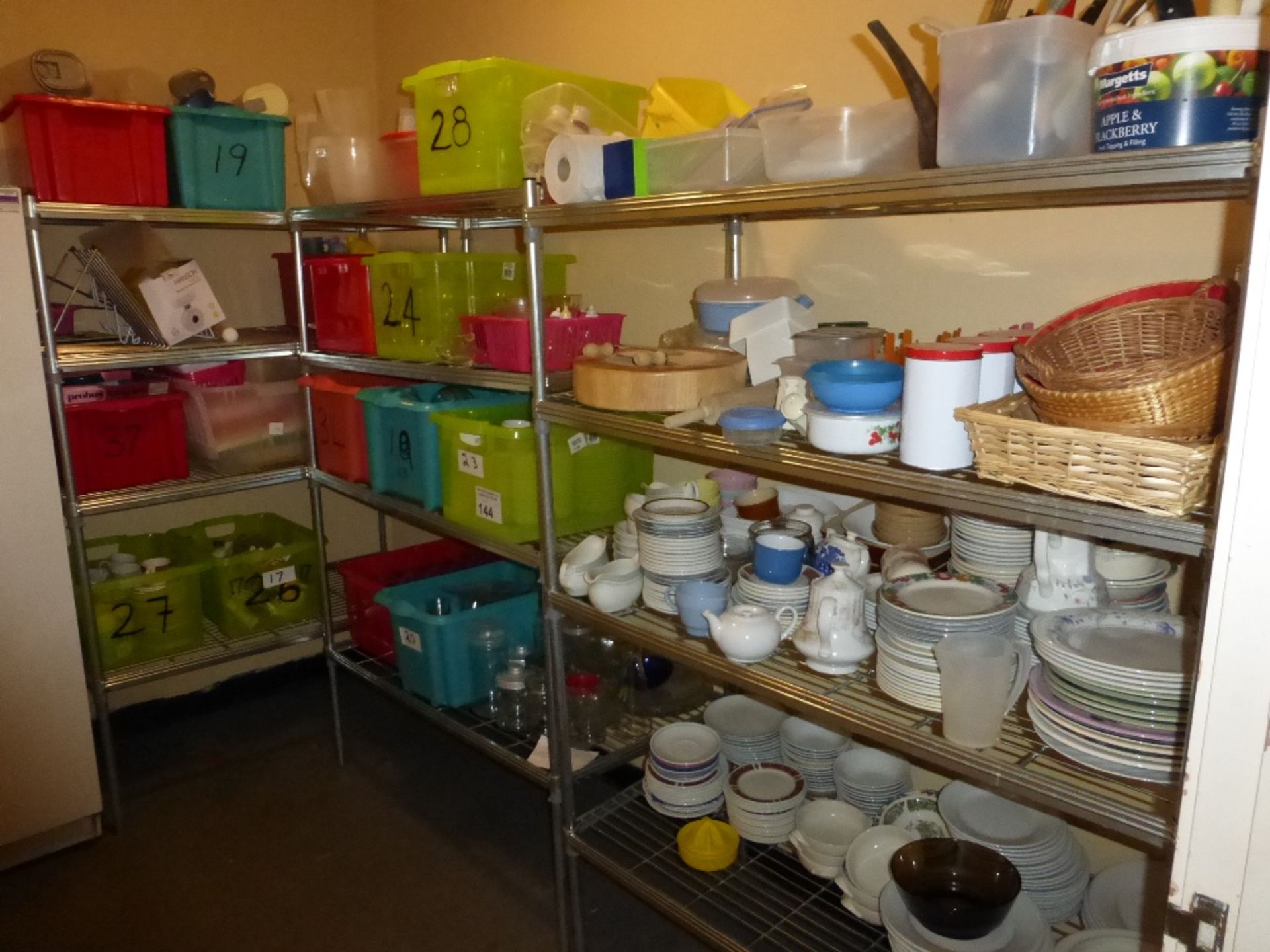 3 metal four tier racks and a large quantity of miscellaneous glassware, catering crockery,