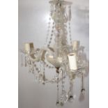 NV- an ornate three branch hanging light with cut glass droplets