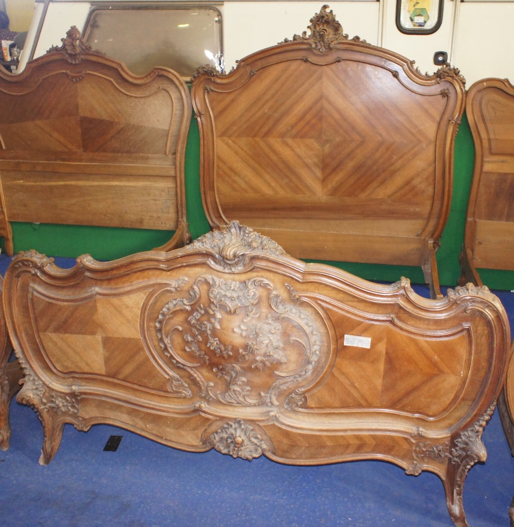 NV- A decorative carved mahogany French style double bed