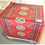 NV- a small red ground Bokhara design rug. Approx. 94 X 61cm