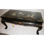 NV- A decorative oriental black lacquer coffee table with floral and bird decorated top