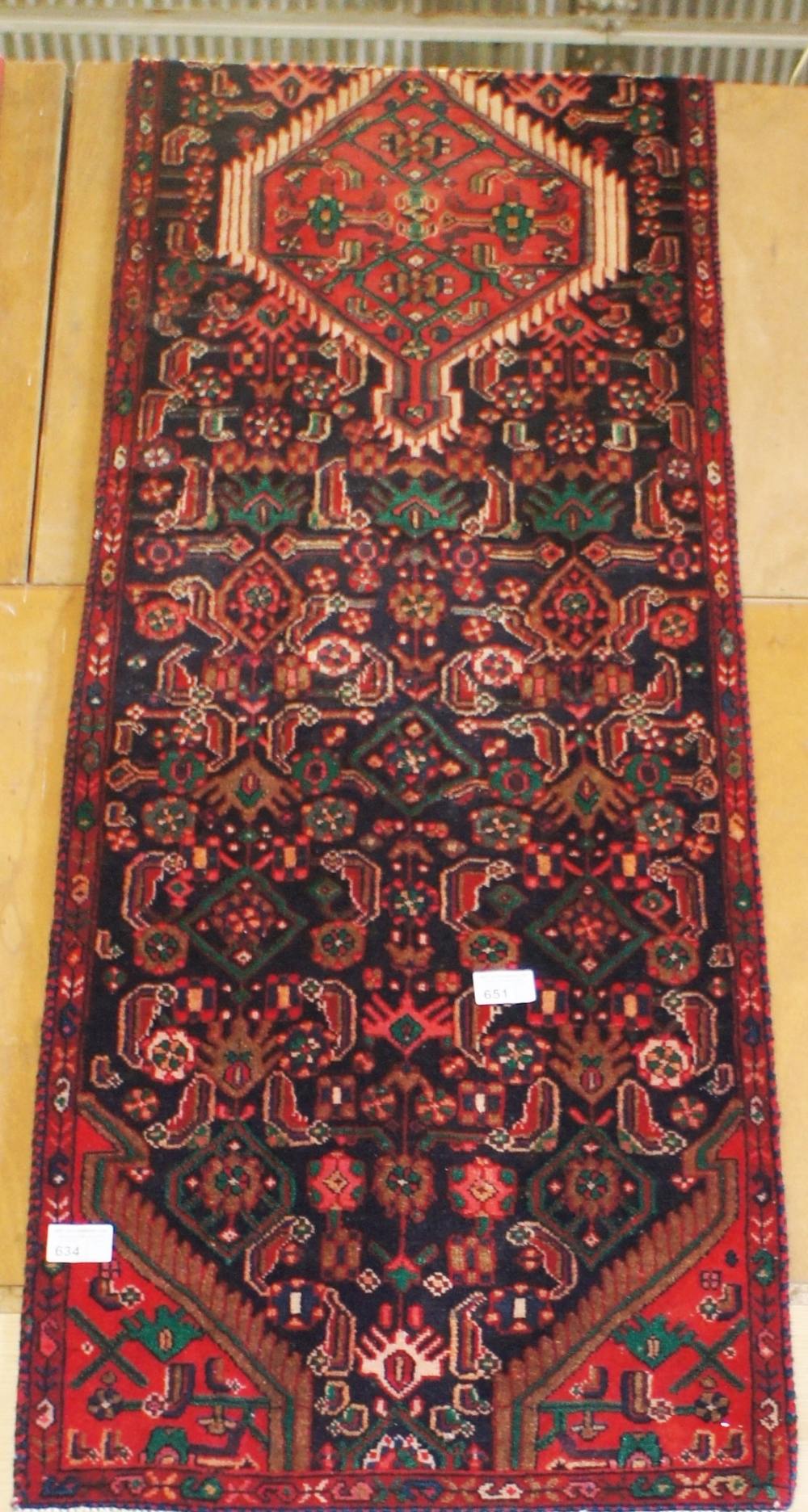 NV- a hand woven blue ground Persian runner. Approx. 340 X 86cm