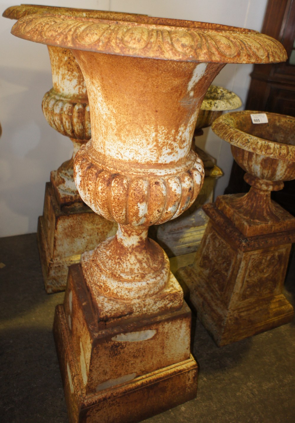 NV- A pair of decorative classical design cast iron garden urns