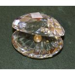 NV- a Swarovski crystal oyster with pearl
