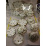 NV- a qty. of white and floral patterned Havilland tea ware