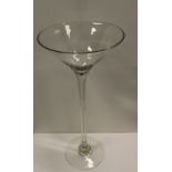 NV- a large and tall display type cocktail glass