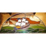 NV- a semicircular leaded stained glass panel of a ship