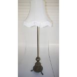NV- An ornate brass adjustable lamp standard with shade