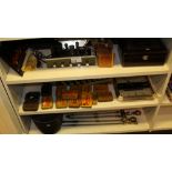 NV- 3 shelves of misc brass fire irons, old tobacco tins and interesting electrical sundries etc