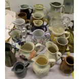 NV- a qty. of misc. decorative pottery china and glass jugs