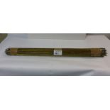 NV- A bundle of old brass stair rods