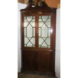 NV- A 19th century inlaid mahogany floor standing corner cabinet with swan neck cresting, two astral