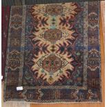 NV- a brown patterned Persian rug. Approx. 167 X 111cm - shows signs of wear and repair