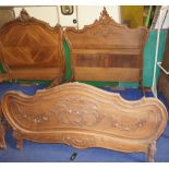 NV- A decorative carved mahogany French style double bed