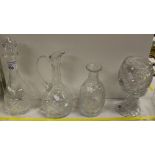 NV- a cut glass decanter, a cut glass narrow neck jug, a cut glass water carafe and a large cut