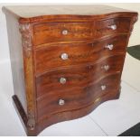 NV- A fine mahogany serpentine front chest of two short and three long graduated drawers with