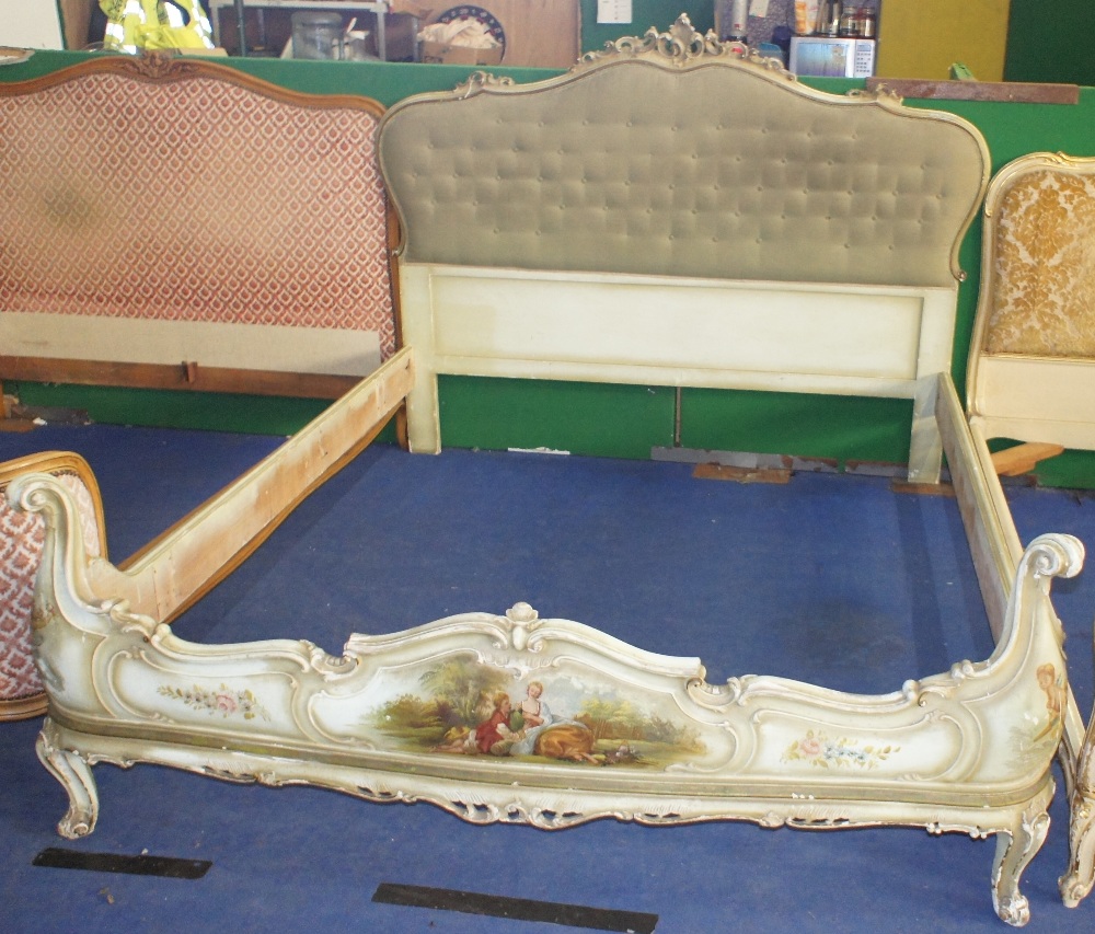 NV- A white painted and pictorial decorated French style double bed with a buttoned upholstered