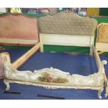 NV- A white painted and pictorial decorated French style double bed with a buttoned upholstered