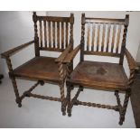 NV- A pair of oak carver chairs with a lift out seats