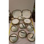 NV- a blue white and gold patterned Tuscan china part tea set